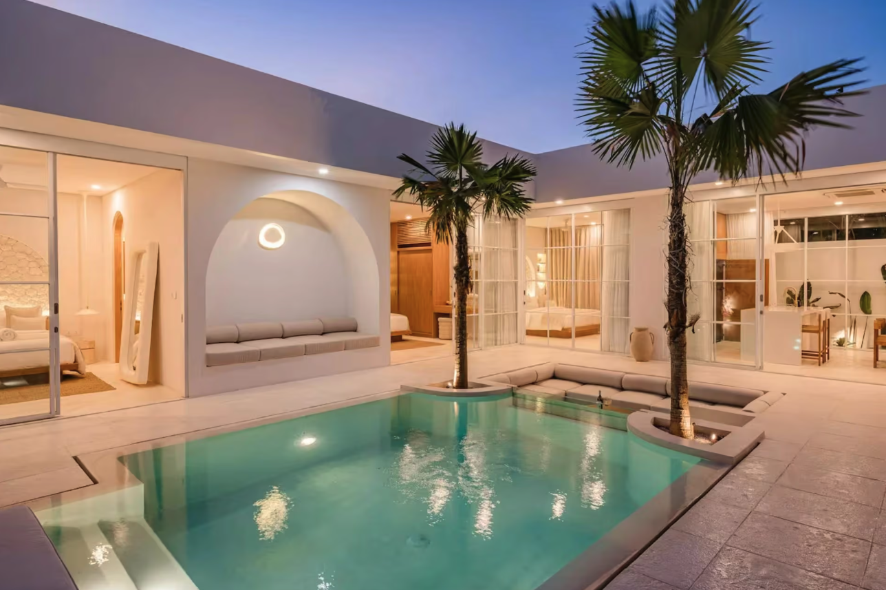 Nisi Villas pool and courtyard at dusk